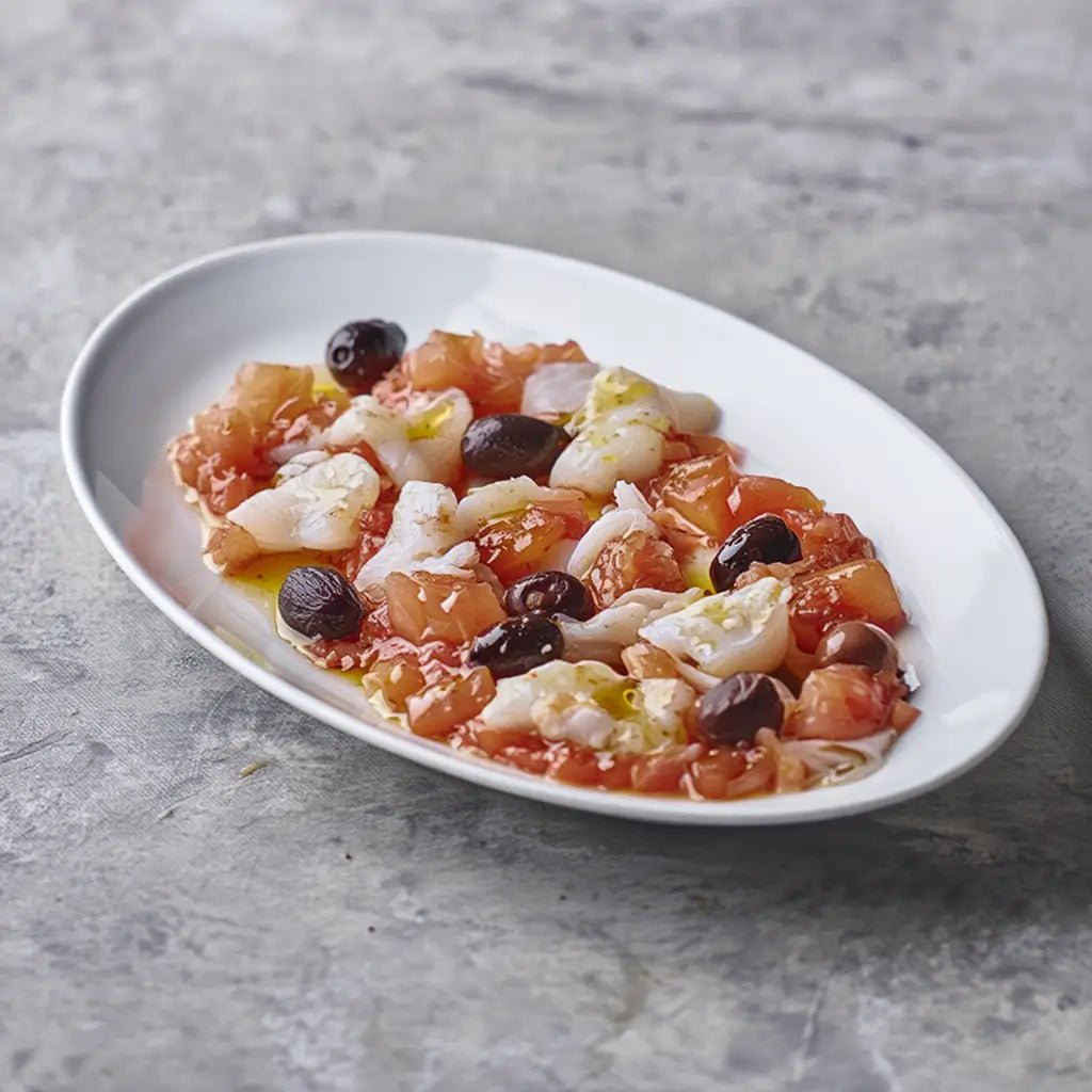Esqueixada de bacalao con tomate rallado, aceitunas y aceite de oliva – Prepared Appetizers & Side Dishes | Bacalalo gourmet