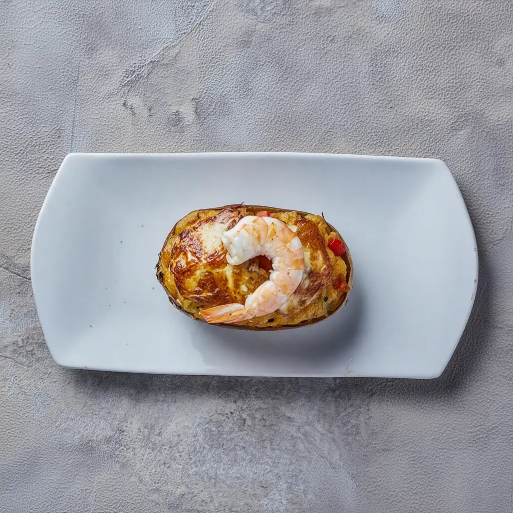 Patatas rellenas de bacalao y sanfaina gratinadas con queso – Prepared Meals & Entrées | Bacalalo gourmet