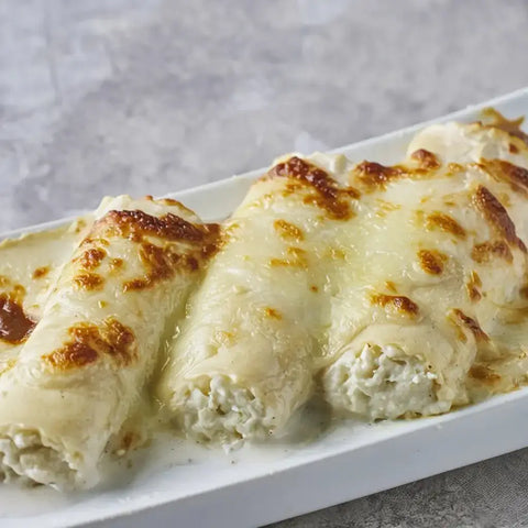 Canelones de brandada de bacalao con bechamel casera gratinada – Prepared Meals & Entrées | Bacalalo gourmet