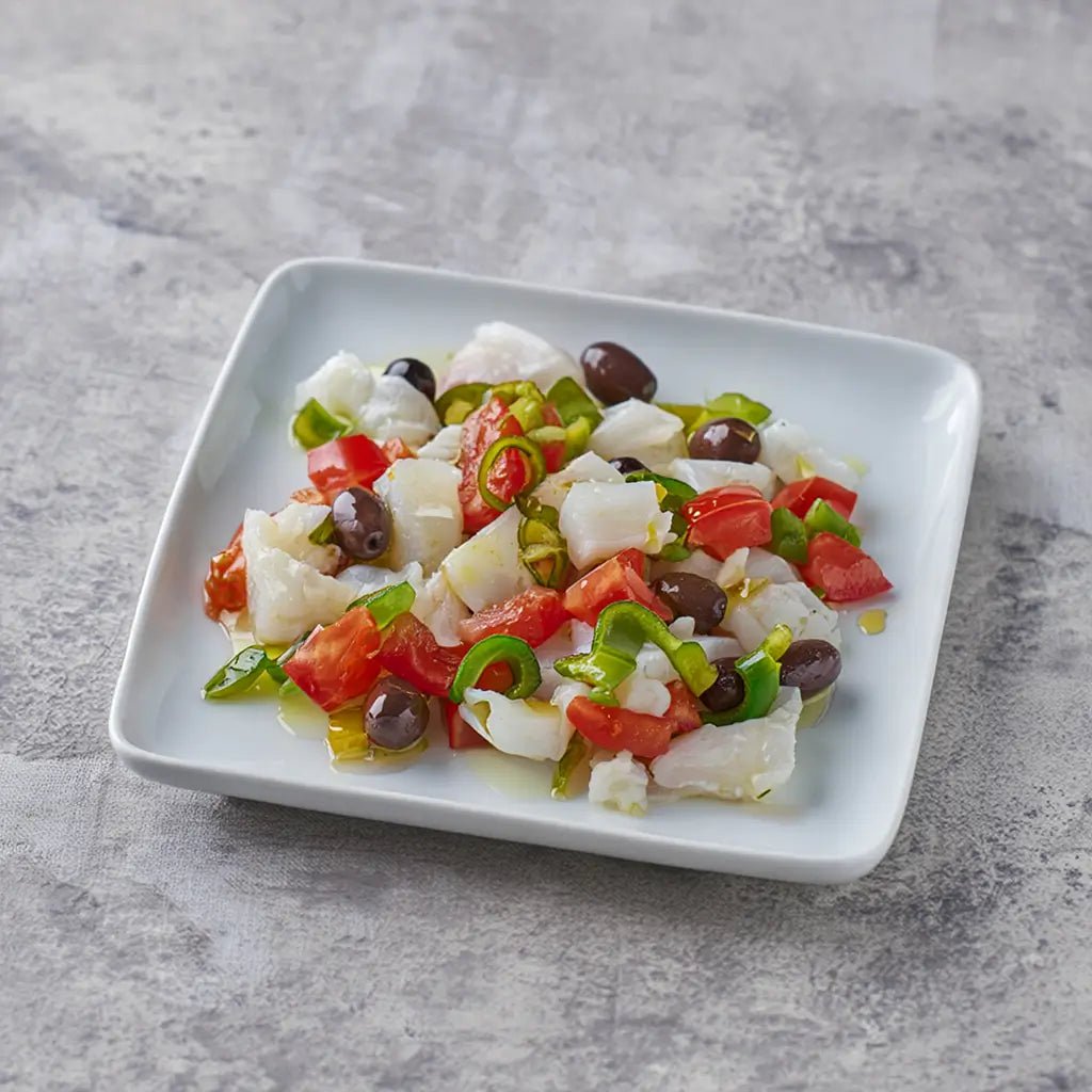 Esqueixada de bacalao con pimiento, aceitunas negras y aceite de oliva – Prepared Appetizers & Side Dishes | Bacalalo gourmet