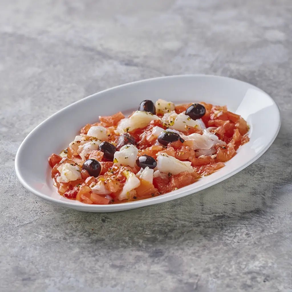 Esqueixada de bacalao con tomate rallado, aceitunas y aceite de oliva – Prepared Appetizers & Side Dishes | Bacalalo gourmet