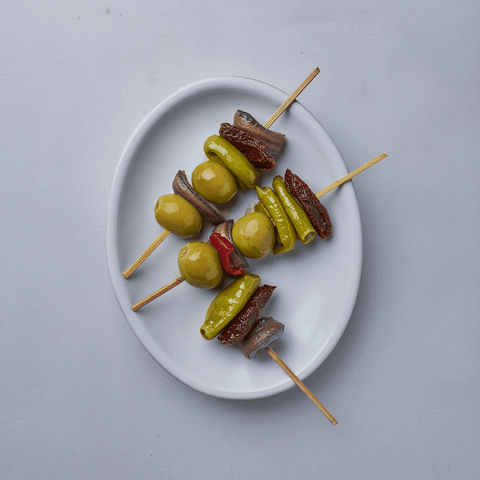 Gilda con anchoa, oliva, guindilla y tomate seco – Prepared Appetizers & Side Dishes | Bacalalo gourmet