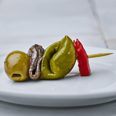 Gilda con anchoa, oliva, guindilla y tomate seco – Prepared Appetizers & Side Dishes | Bacalalo gourmet