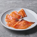 Salmón ahumado suave cortado a mano - conservación y frescura garantizada